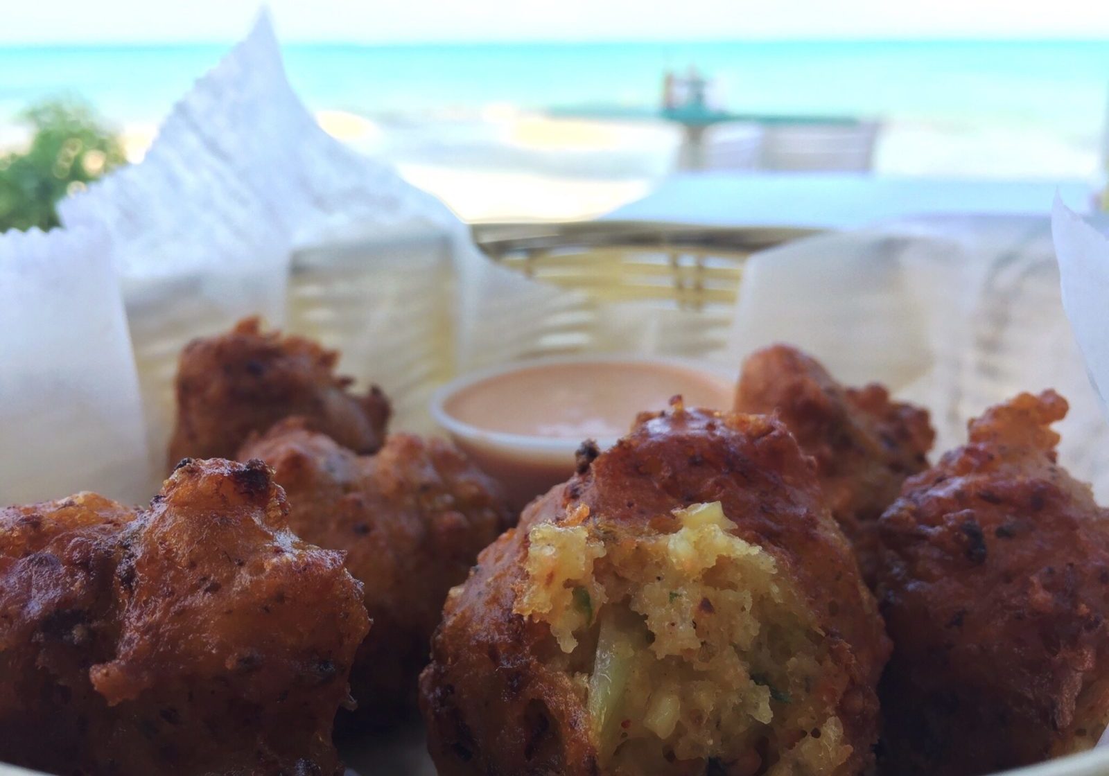 Scrumptious, crunchy and creamy conch fritters served seaside at Da Conch Shack.